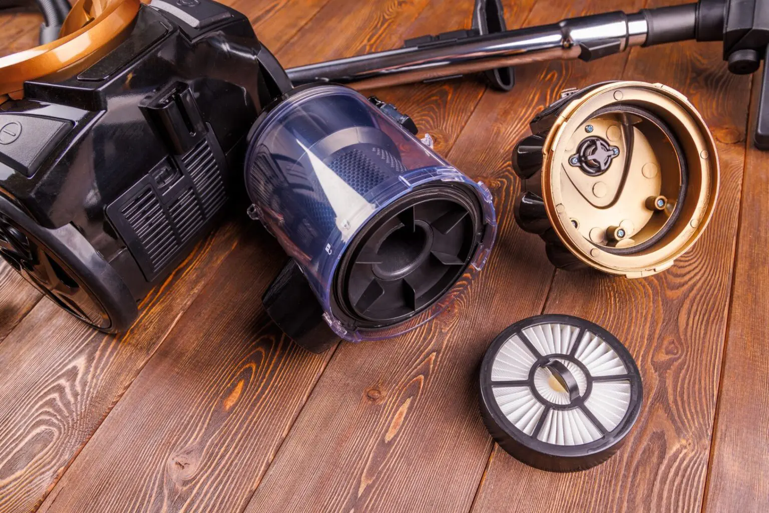 Disassembled vacuum components displayed neatly